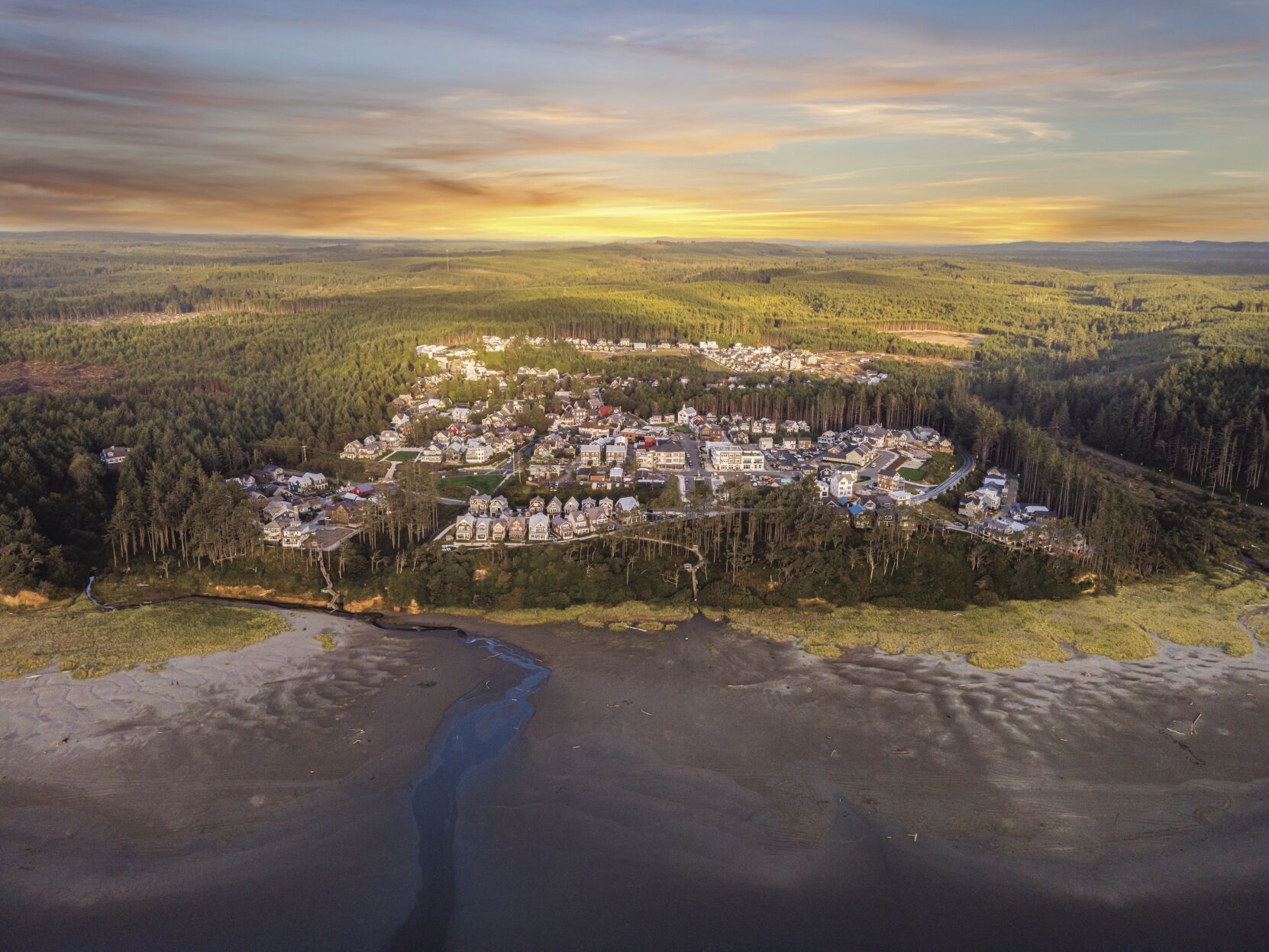 drone ocean sky town wing walker sunset.jpg